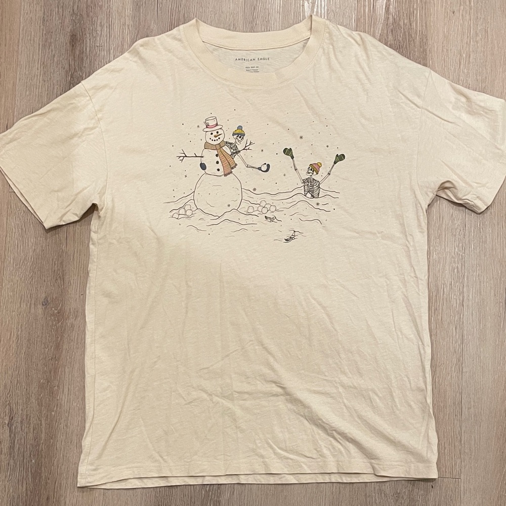 American Eagle Outfitters Cream Snowman and Skeleton Graphic Tee